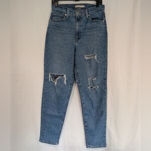 Levi's High-Rise Distressed Jeans in Medium Blue